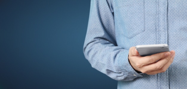 Man hand holding smartphone device