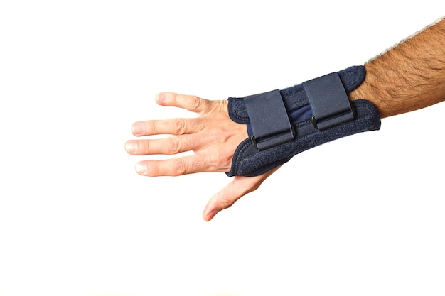 Man hand with therapeutic wrist brace to relieve wrist sprain pain