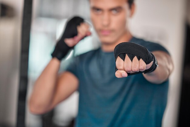 Photo man hands and fists for boxing fitness fight or strength training exercise workout or martial arts at gym fist of male boxer or fighter ready for fighting challenge practice or punching indoors