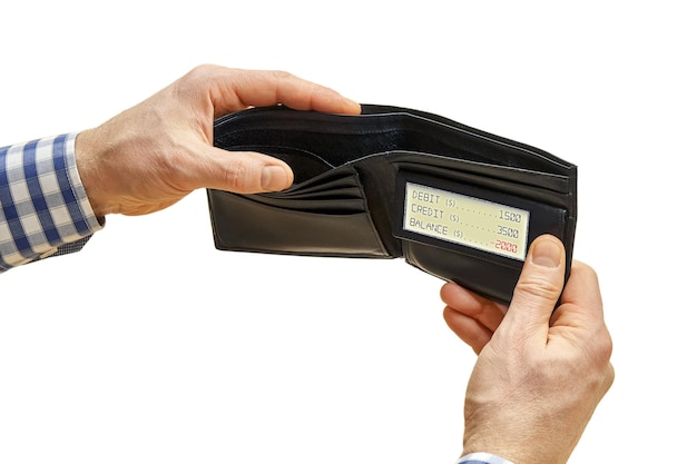 Man hands hold empty black wallet with electronic screen displaying negative balance Crisis concept