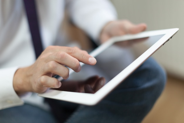 Man hands using digital tablet