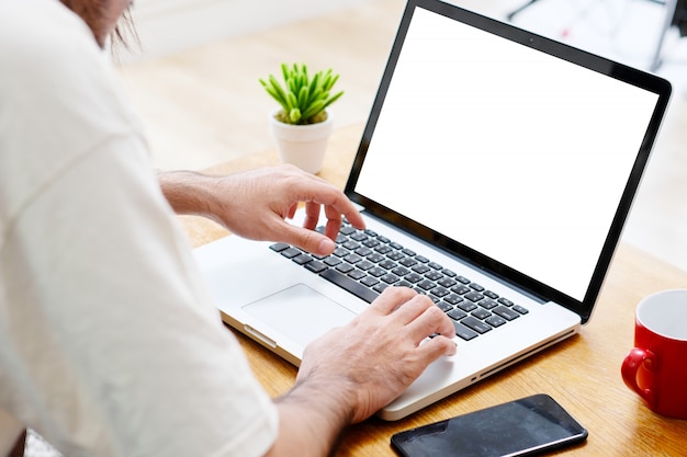 Man hands using laptop computer with blank screen