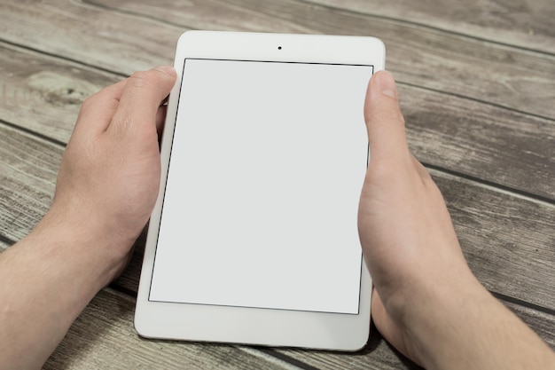 Man hands using and showing the tablet