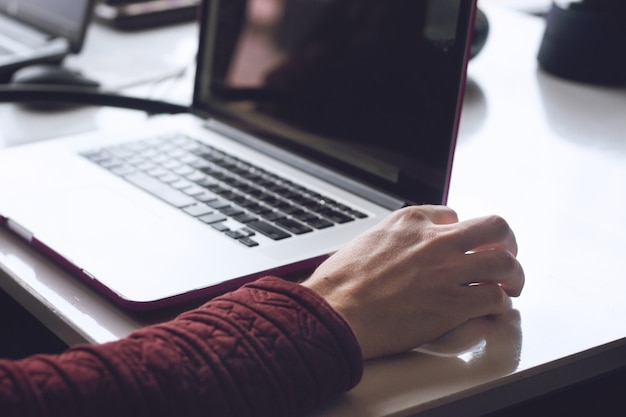 Man hands working on modern laptop