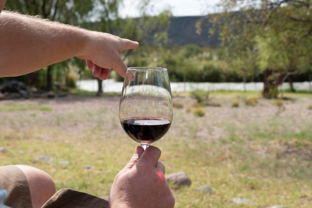 Man having a glass of red wine