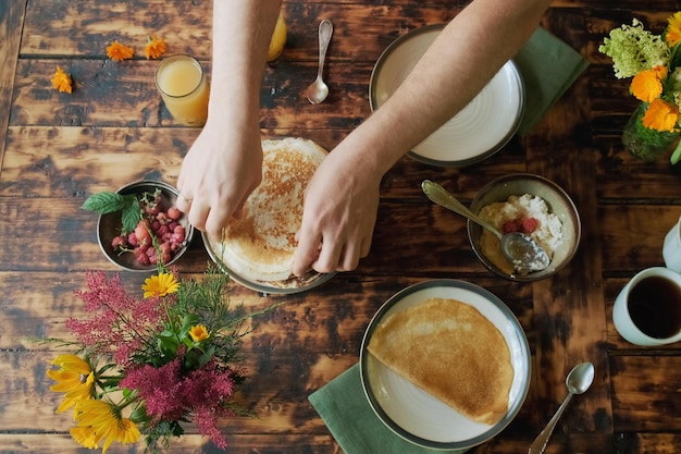 Man having healthy breakfast outside Dining al fresco