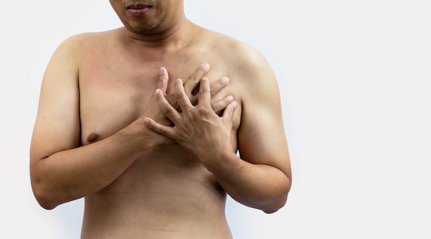 Man having heart-attack  chest pain in isolated background