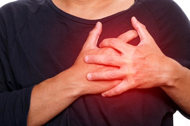 Photo man having heart attack isolated on white background healthcare and health problem concept