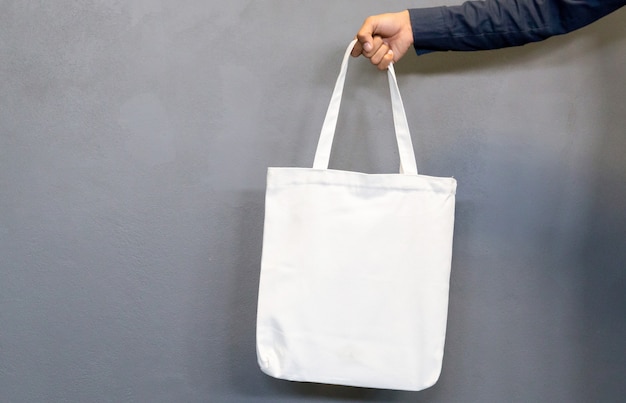 Man holding bag canvas fabric