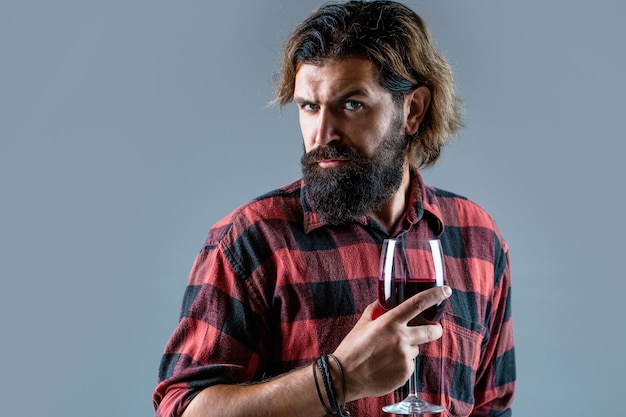 Man holding bottle with champagne, wine. Bottle, red wine glass