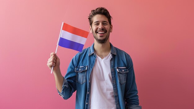 Photo man holding flag of netherlands