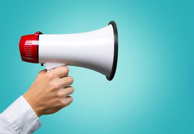 Man holding megaphone on  background