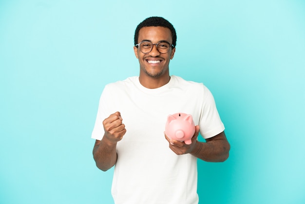 man holding piggybank