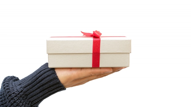 Man holding a silver gift box