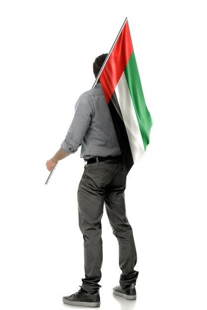 Man holding Uae Flag in White Background Flag of Uae