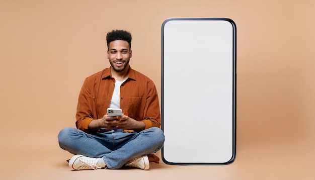 a man holding a white device that says  the back of it