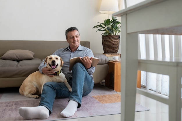 Man at home with his dog companion