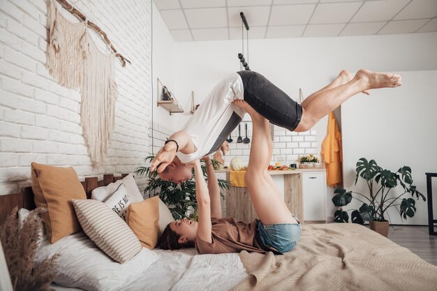 Man imitate plane fly in air with outstretched hands