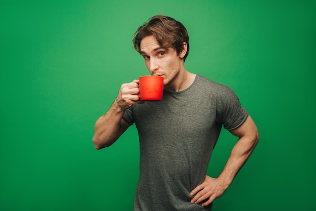 Man is drinking an instant coffee