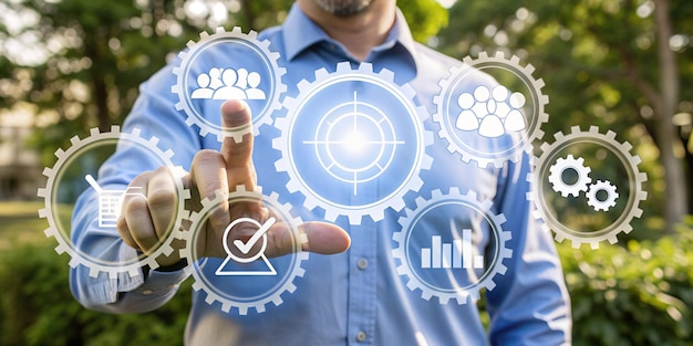 Photo a man is holding a display of cogs and cogs