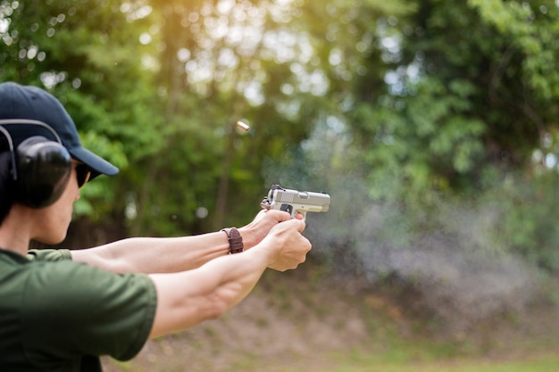 A man is practicing shoot gun 