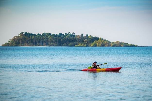 A man kayaking in the sea Ko Chang