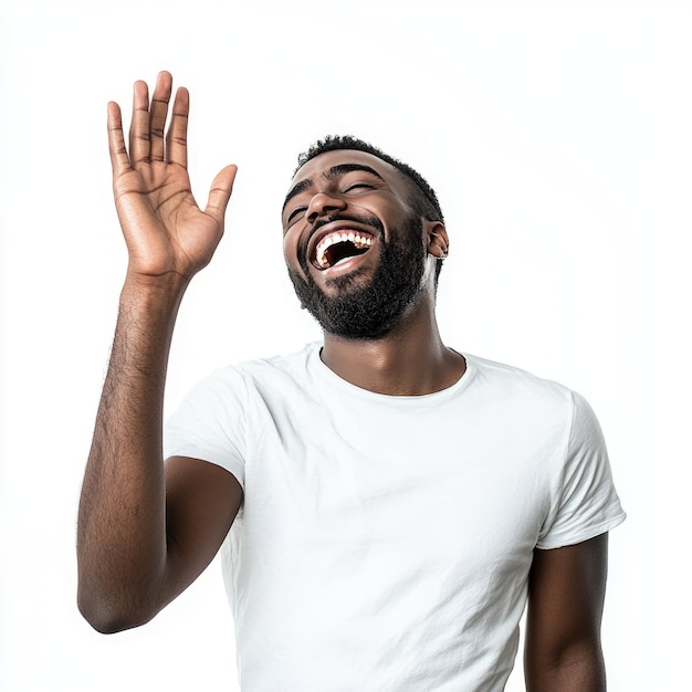 A man laughing his hand raised in a joyful gesture