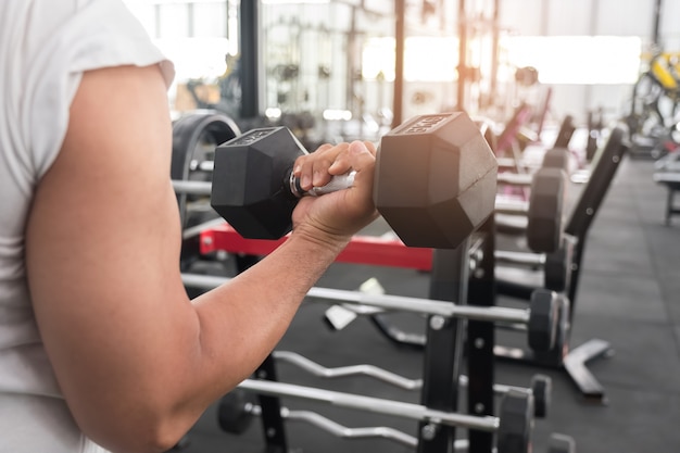 Man lifting dumbbells