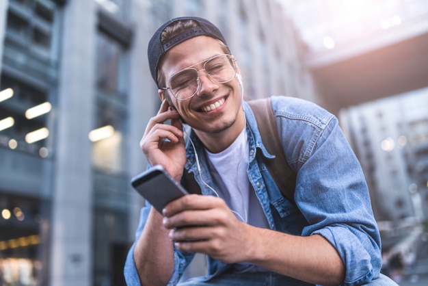 Man listening to music in earphones