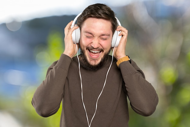 Man listening to music with his smartphone