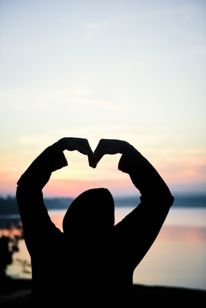 Man making Hands in Heart Shape