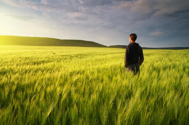 Man in meadow green meadow