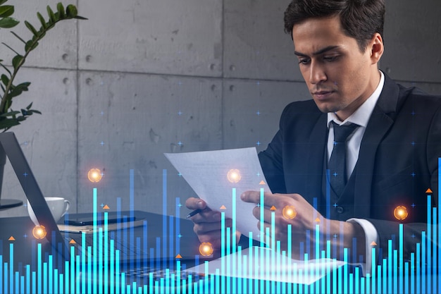 Man in office think and dream datum financial service graph and chart technology drawing concept Double exposure