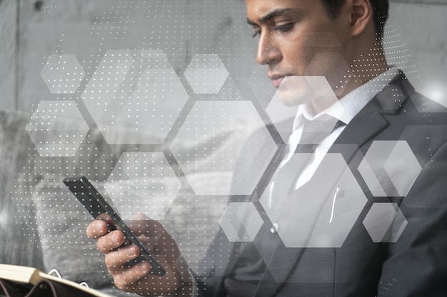 Man in office working with Smartphone Searching for new tech Abstract technology hologram typing phone Double exposure