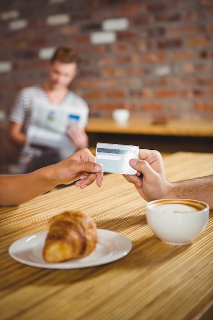 Man paying with his credit card