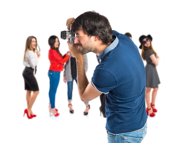 Man photographing over white background