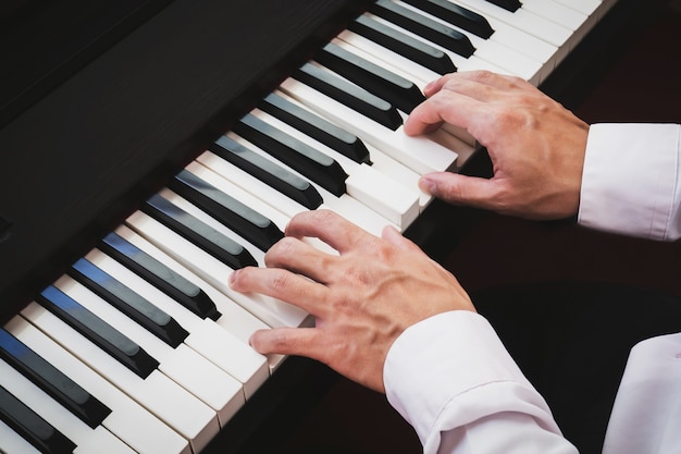 man playing piano