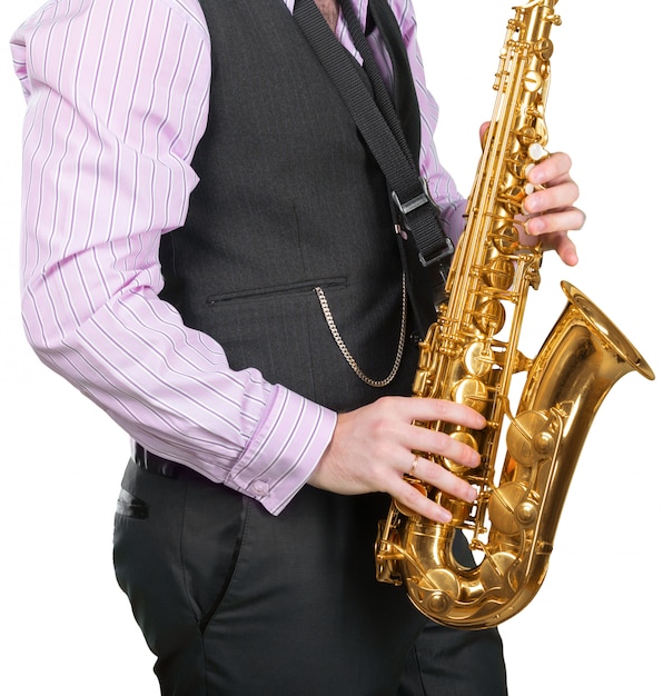 Photo man playing on a saxophone