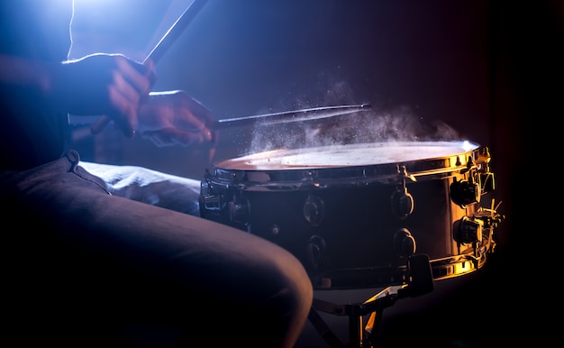 man playing the snare drum