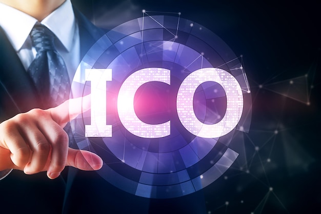 Man pointing at ICO button