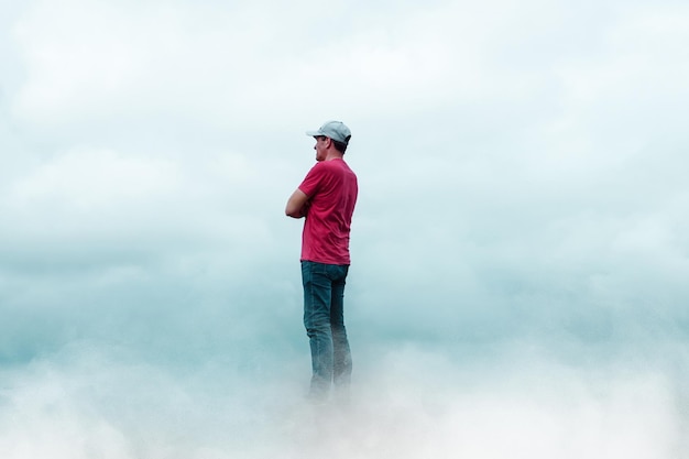 man portrait gesturing in the sky and clouds