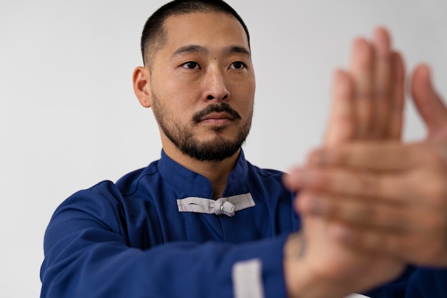 Man practicing tai chi front view