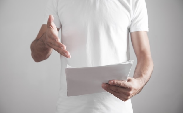 Man reading document in office.