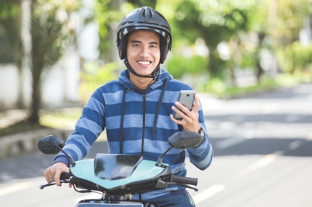 Man riding a motorcyle or motorbike