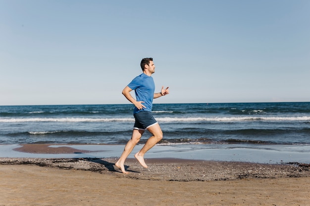 Man running at the beach