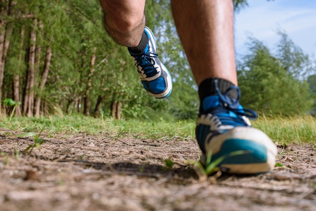 The Man running close up legs and feet