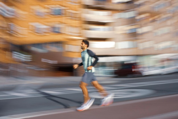 man running on the street in Bilbao city, Basque country, Spain