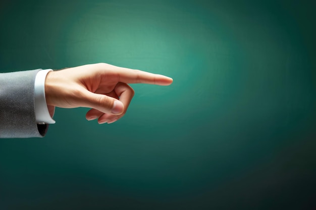 A man's hand makes a decisive pointing gesture indicating a clear direction and purpose