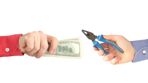 Man's hand with outstretched dollar bills to pay for writing. Business and Finance.