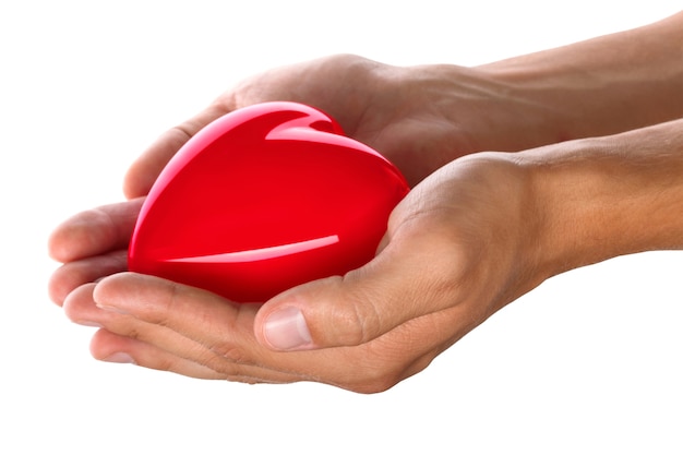 Man's hands giving red heart